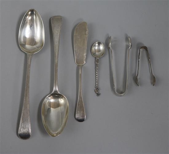 Two Georgian silver spoons and other cutlery.